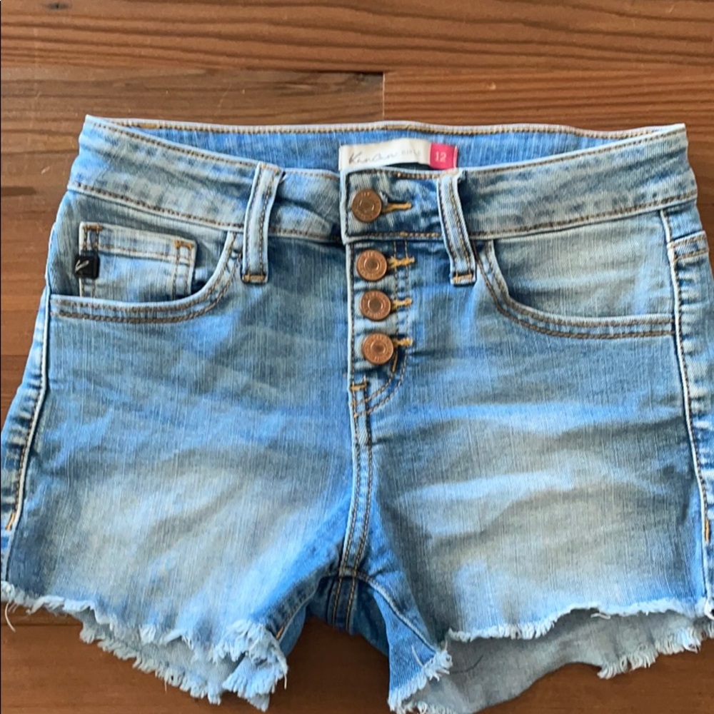 Light wash, button fly girl’s denim shorts